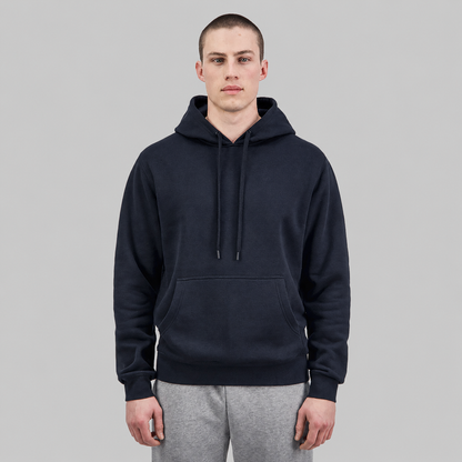 Studio product image of the Navy Mens Everyday Hoodie, featuring a relaxed fit, soft 350 GSM brushed fleece construction, adjustable hood with drawcord, ribbed cuffs and hem, and a classic front kangaroo pocket.