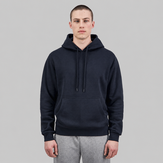 Studio product image of the Navy Mens Everyday Hoodie, featuring a relaxed fit, soft 350 GSM brushed fleece construction, adjustable hood with drawcord, ribbed cuffs and hem, and a classic front kangaroo pocket.